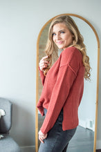 Load image into Gallery viewer, Model showing side view of henley sweater
