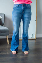 Load image into Gallery viewer, Front view of model wearing flare jeans.

