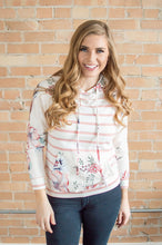 Load image into Gallery viewer, Model wearing floral hoodie
