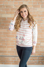 Load image into Gallery viewer, Model standing forward wearing floral hoodie
