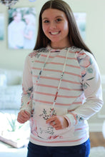 Load image into Gallery viewer, Model wearing floral sweatshirt.

