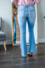 Load image into Gallery viewer, Back view of model wearing high waisted flares
