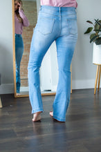 Load image into Gallery viewer, Back view of model wearing high waisted flares
