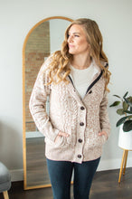 Load image into Gallery viewer, Model wearing hooded sweater cardigan.
