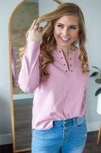 Load image into Gallery viewer, Model wearing pink long sleeve shirt.
