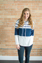 Load image into Gallery viewer, Model showing front view of striped hoodie.
