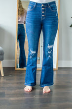 Load image into Gallery viewer, Model wearing button fly flare jeans
